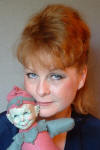 caroli original doll artist
                                      with a dilly wizard