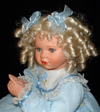 caroli porcelain doll charitys church and steeple